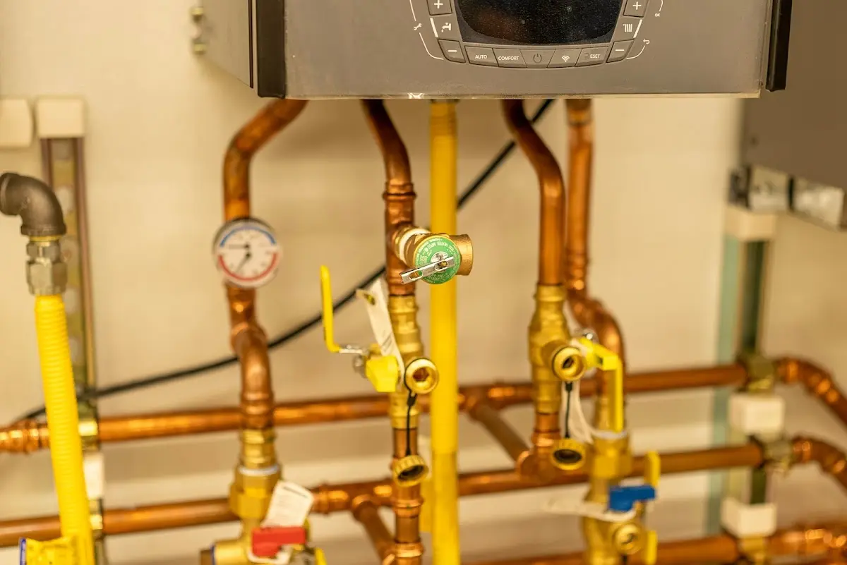 Licensed technician providing Water Heater Installation for a homeowner in Ada